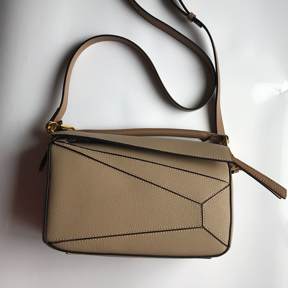 NWT TAN LEATHER PUZZLE STYLE BAG